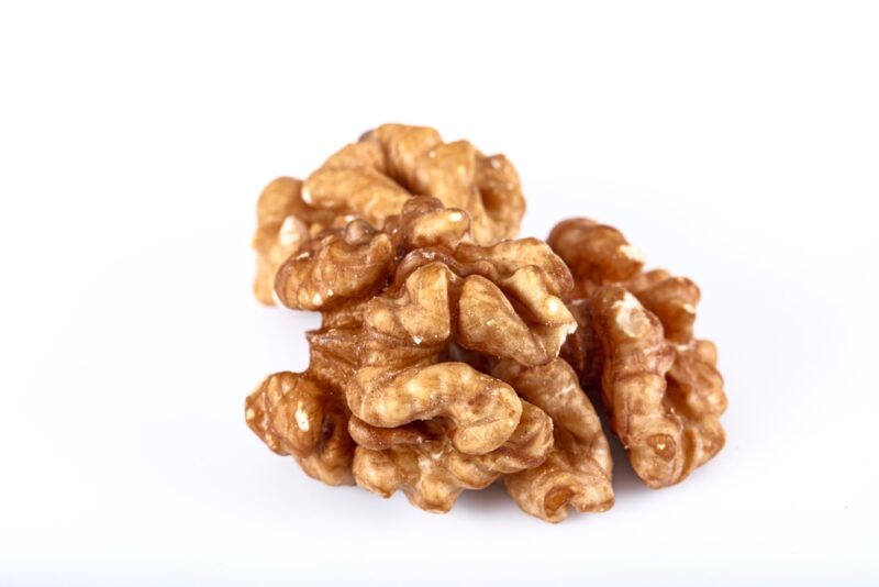 Closeup of big shelled walnuts pile