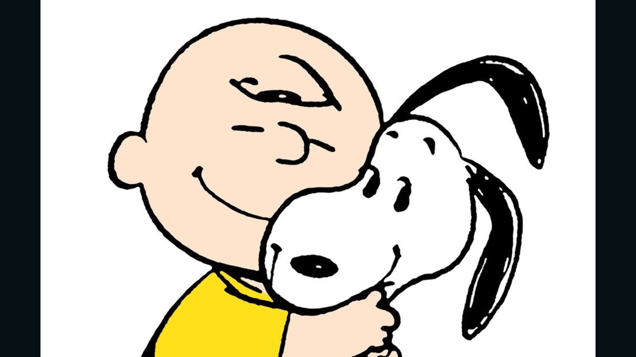 Charlie Brown hugging Snoopy Peanuts Worldwide LLC