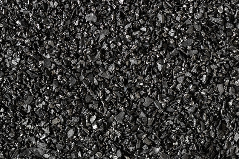 Close-up of black activated carbon texture