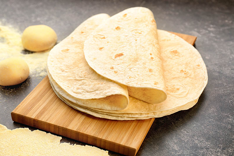 Delicious tortillas on kitchen table
