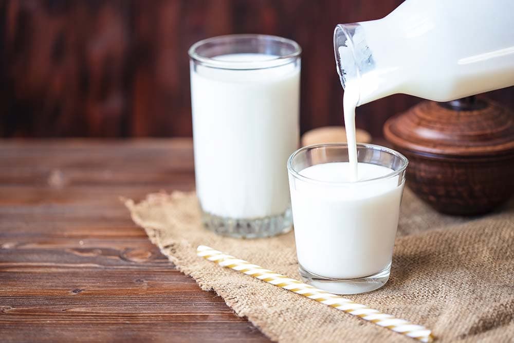 Pouring homemade kefir