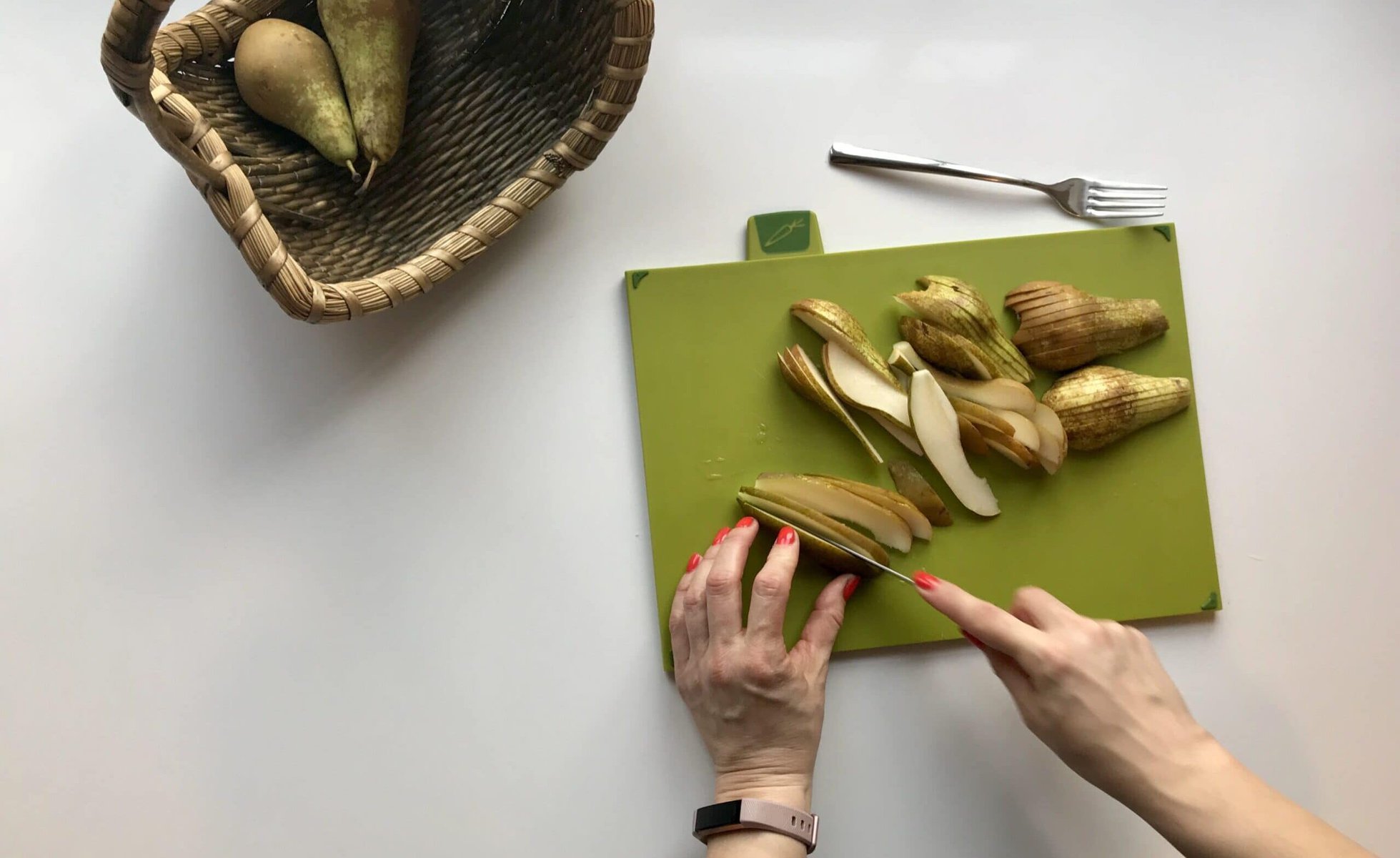 Woman slicing pears