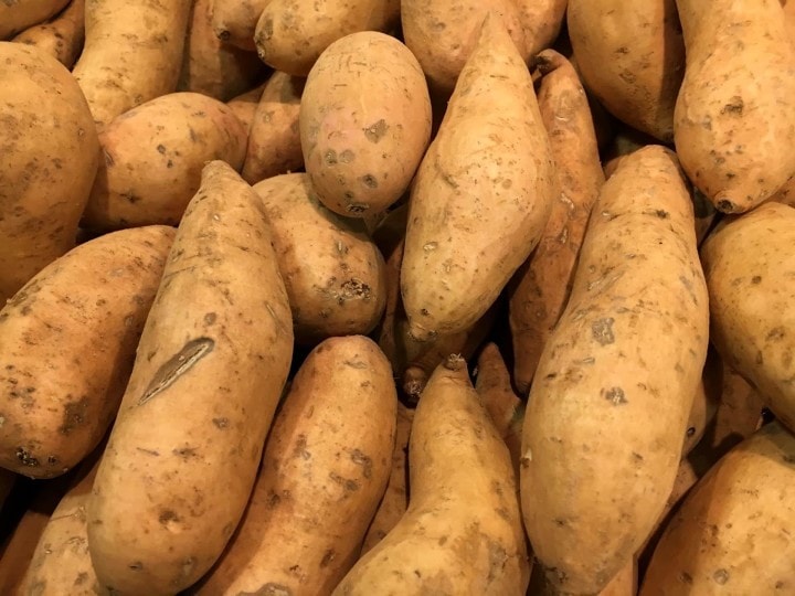 Yams stacked neatly on the table