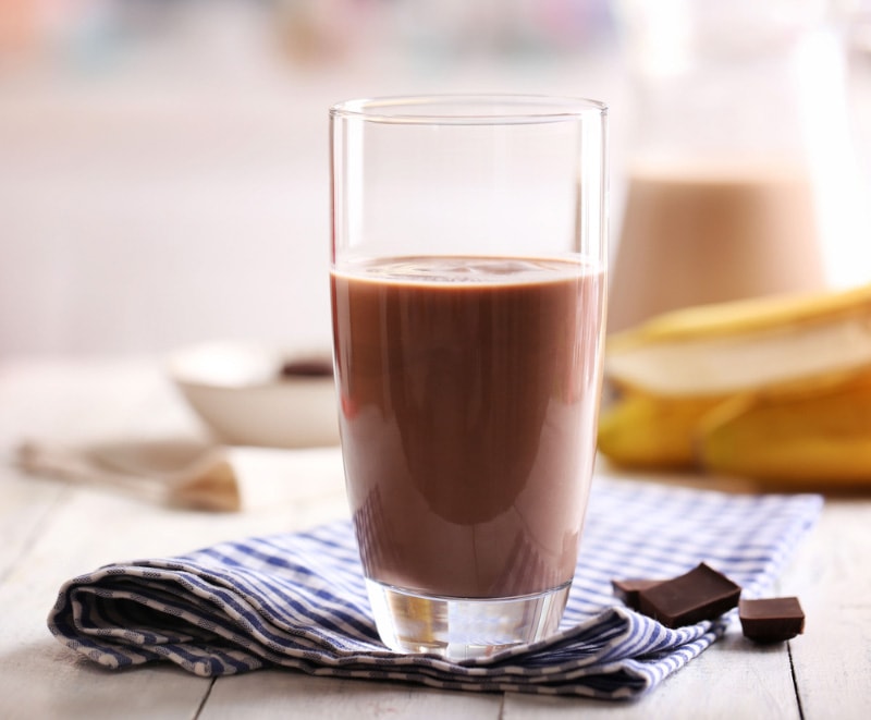 glass of chocolate milk on table