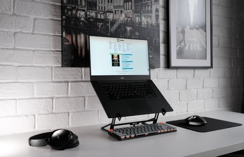 laptop on a table riser