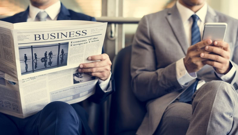 man reading newspaper