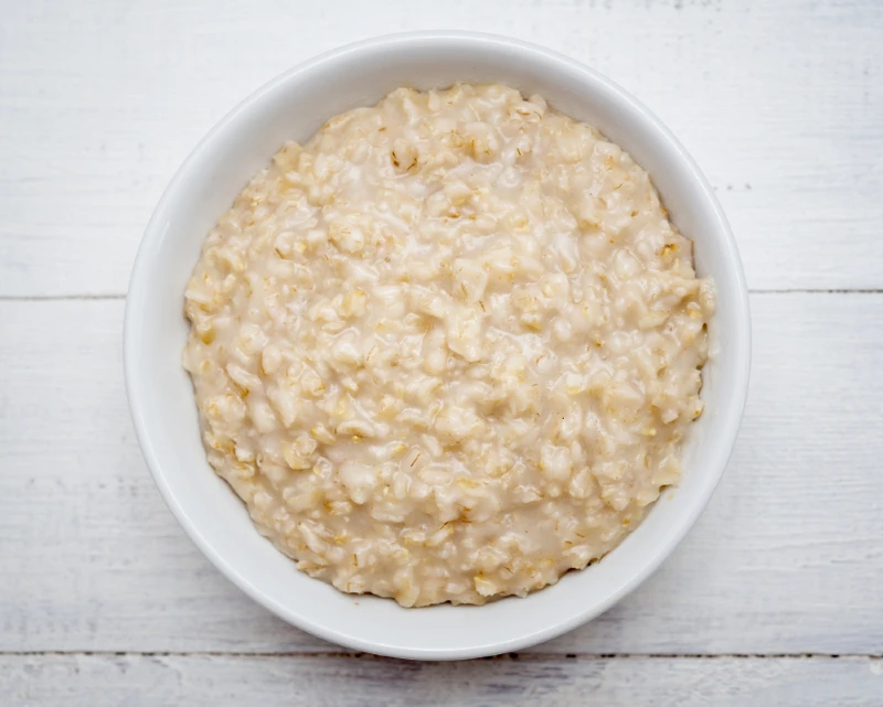 top view of a bowl of cooked oatmeal