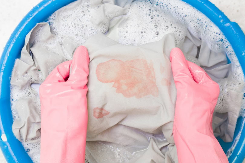 washing clothes with stains